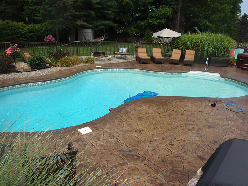 Swimming pool and stamped concrete project example 52